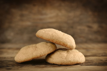 Tasty sugar cookies on wooden table