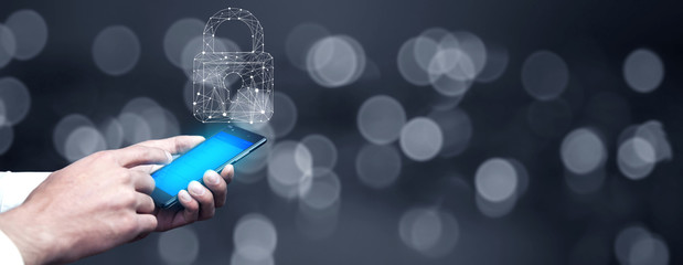 business man hand phone with  lock