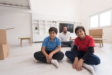 Obraz premium portrait of happy young boys with their dad
