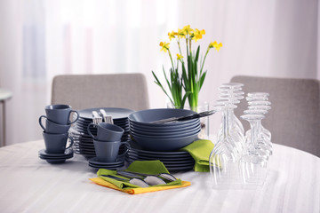 Set of dishware on table in restaurant