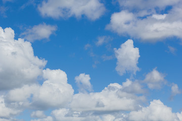 Naklejka na ściany i meble Picturesque cloud landscape in the blue sky