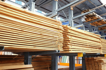 Many wooden planks in hardware store