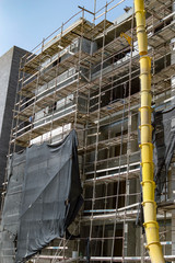 Housing building with scaffolding installed