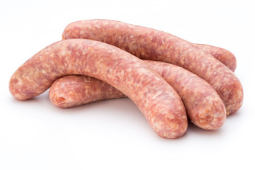 Raw sausage with parsley leaf isolated on white background.
