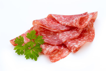 Salami smoked sausage slices isolated on white background cutout.