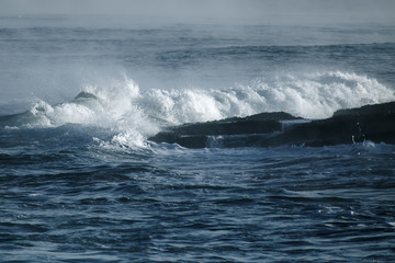 Big stormy ocean wave. Blue water background