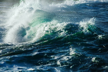 Big stormy ocean wave. Blue water background