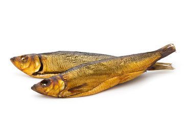 Smoked trout in front of a white background.