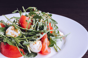 Fresh, summer salad with arugula leaves