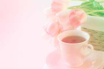 Fototapeta na wymiar fresh pink lilies and coffee cup.