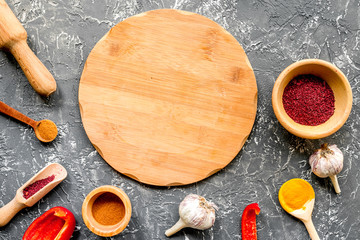 Cook workplace with kitchen tools and sweet pepper gray background top view