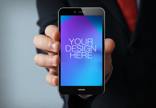 User Holding Up Smartphone Mockup 1