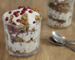 Yogurt and Granola Parfait with Pomegranate Seeds and Almond Yogurt