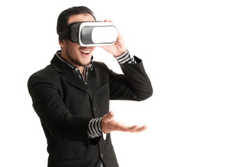 Isolated young businessman with virtual reality glasses