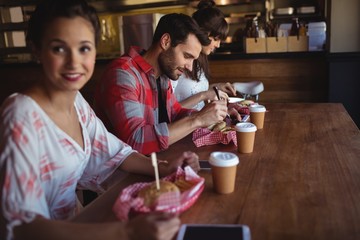 Friends having burger together