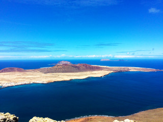 Fototapeta na wymiar A beautiful island and amazing blue sky