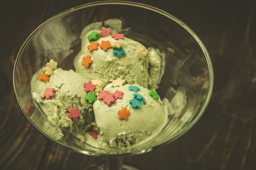 pistachio ice cream in a glass with beautiful/pistachio ice cream in a glass