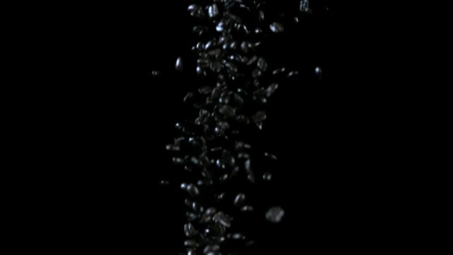 Abstract Droplets Falling Over Black Background and Landing in Bucket