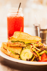 turkey brie melt with garden salad and a glass of  black cherry tarragon soda