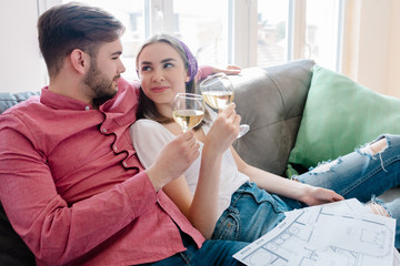 Toasting to their life together in the new house
