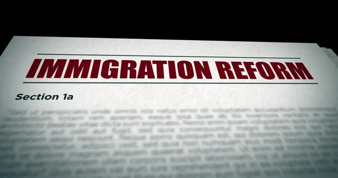 Camera pans over Immigration Reform government Bill document