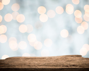 Empty wooden perspective platform with sparkling abstract blur bokeh used as template to mock up for display product