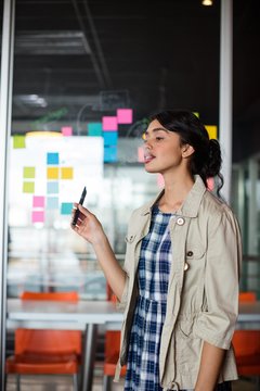 Female executive smoking electronic cigarette