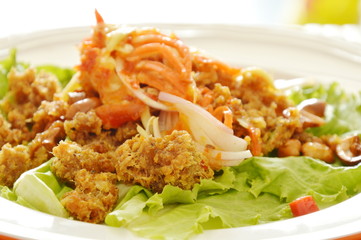crispy fried chop catfish with green mango dressing sweet and sour sauce salad 