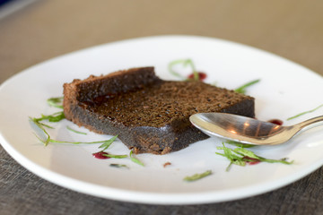 Slice of flourless gluten free chocolate cake