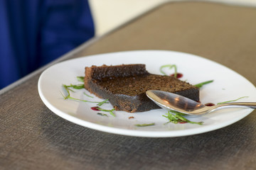 Slice of flourless gluten free chocolate cake