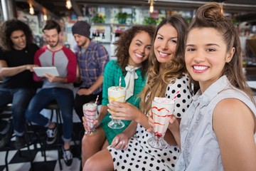 Female friends having drink 
