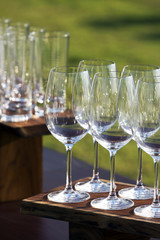 Empty wine glasses prepared for serving