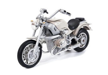 Obraz na płótnie Canvas White toy motocycle isolated on white background.Motorcycle toy isolated