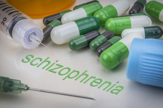 Schizophrenia, Medicines And Syringes As Concept Of Ordinary Treatment Health