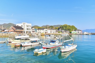 Fototapeta na wymiar Colorful Boats at Tadanoumi Port in Hiroshima Prefecture