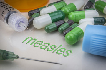 Measles, medicines and syringes as concept of ordinary treatment health