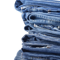 Jeans trousers stack on white background