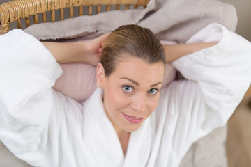 beautiful woman in bathrobe waiting for massage
