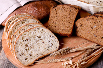 Fresh bread on wooden table