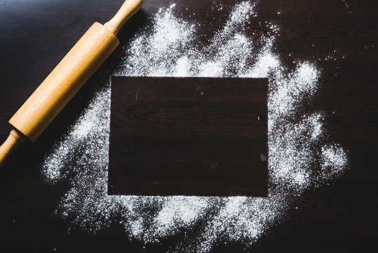 Frame border formed by wheat flour and bakery wooden roller