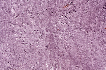 Purple color weathered cement wall pattern.