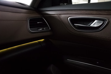 Obraz na płótnie Canvas Car Interior - Armrest - Control panel