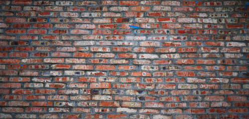 Aged red brick wall background