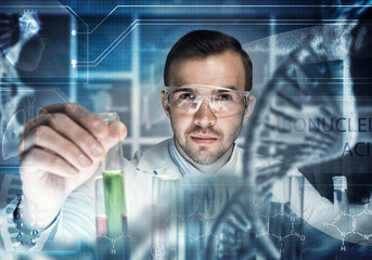 Young scientist mixing reagents in glass flask in clinical laboratory