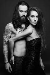 Fototapeta na wymiar sexy beautiful couple with tattoo