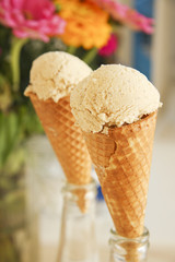 Chicory ice cream on glass bottle in restaurant