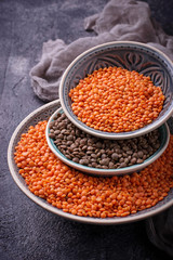 Bowls with red and black lentils