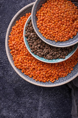 Bowls with red and black lentils