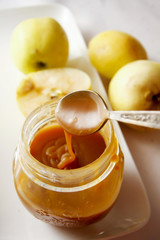 caramel sauce with peach on white platter