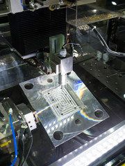 CNC wire cut machine cutting high precision mold parts, Inspection dimension on machine